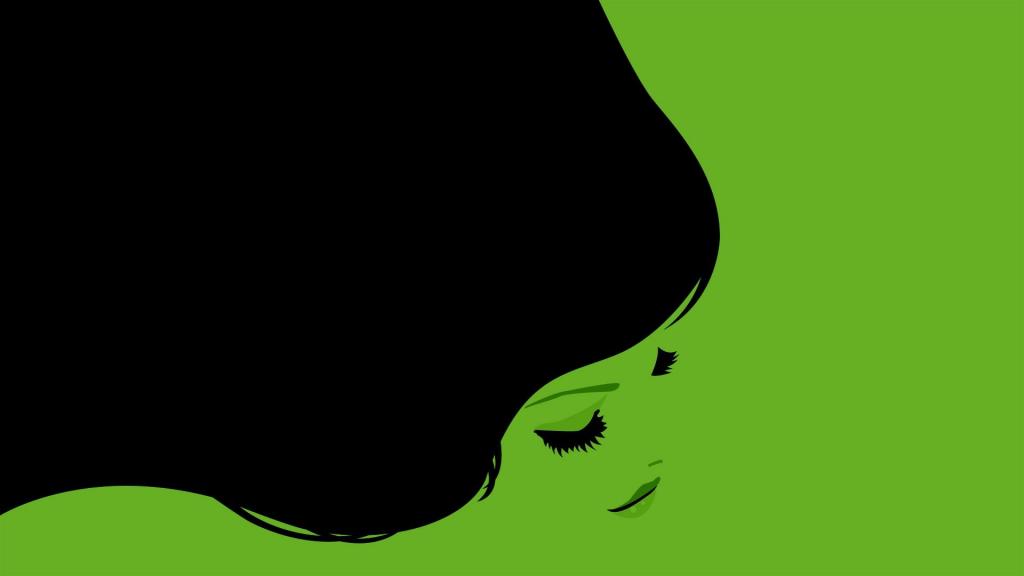 黑头发的女孩，绿色的背景
