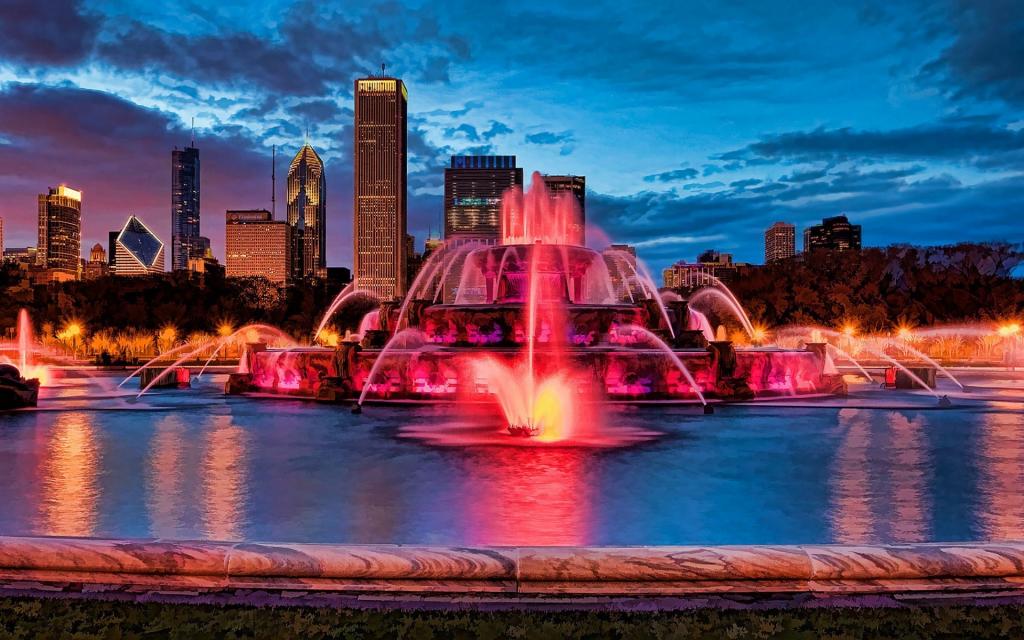 在城市喷泉的粉红色照明