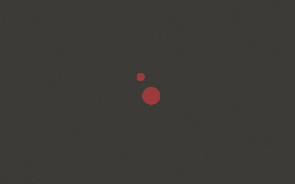 两个红色的小圆点，黑色背景