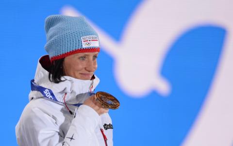 挪威金牌Marit Bjorgen在滑雪比赛中的主人