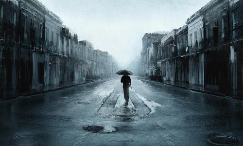 一个孤独的人在伞下