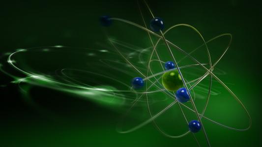 一个原子的模型在绿色背景的
