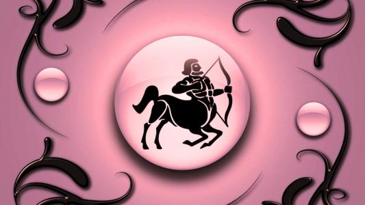 黄道十二宫射手座与粉红色的背景上的标志与黑色的装饰