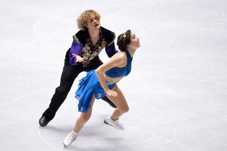 查理·怀特和梅丽·戴维斯美国花样滑冰选手在索契获得金牌和铜牌