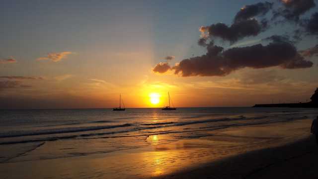 海滨黄昏日落余晖图片