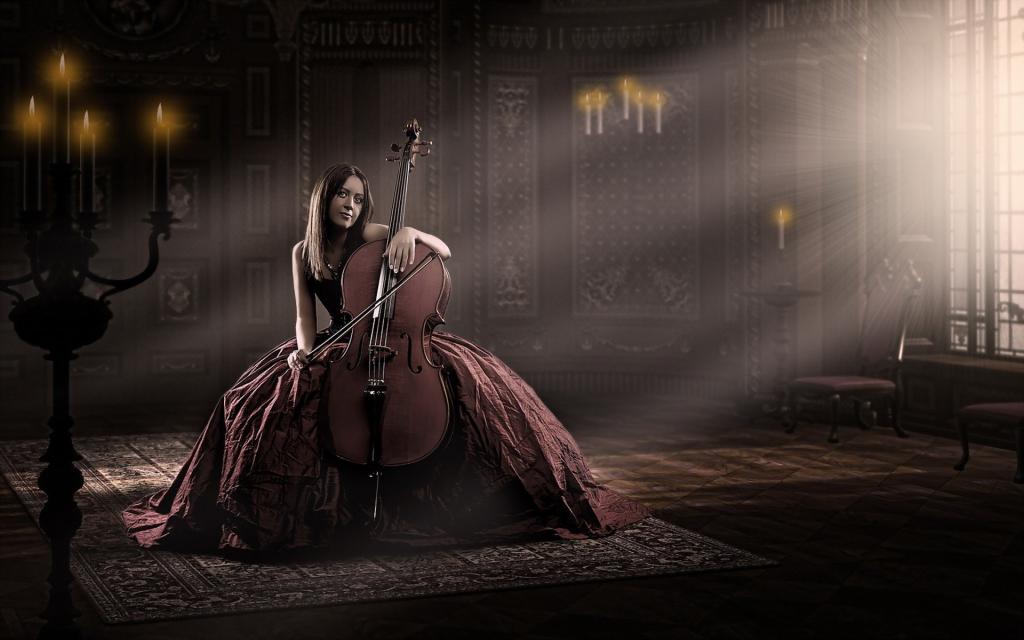 穿豪华礼服的女孩演奏大提琴