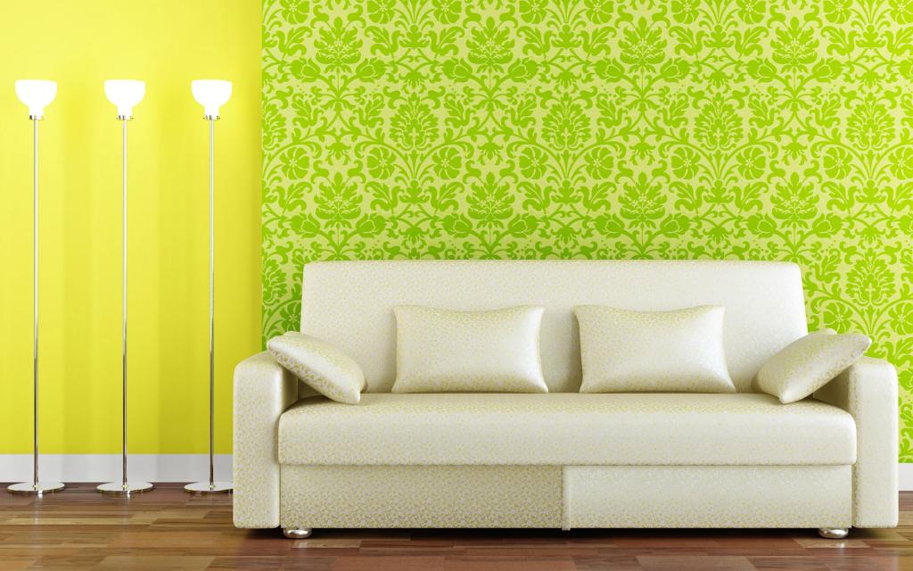 绿色壁纸背景上的白色沙发