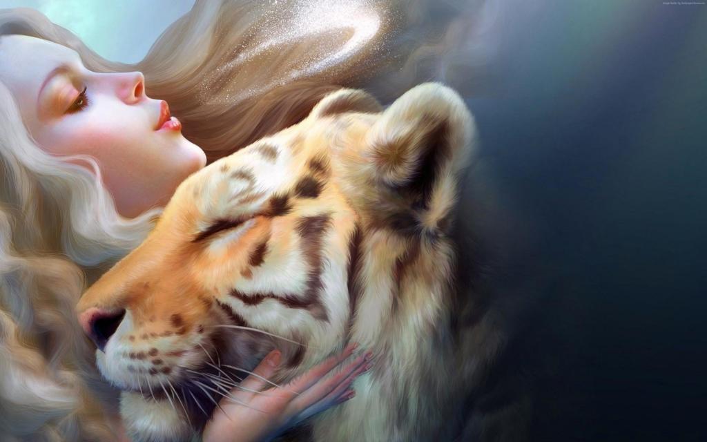 美丽的年轻女孩与一只老虎