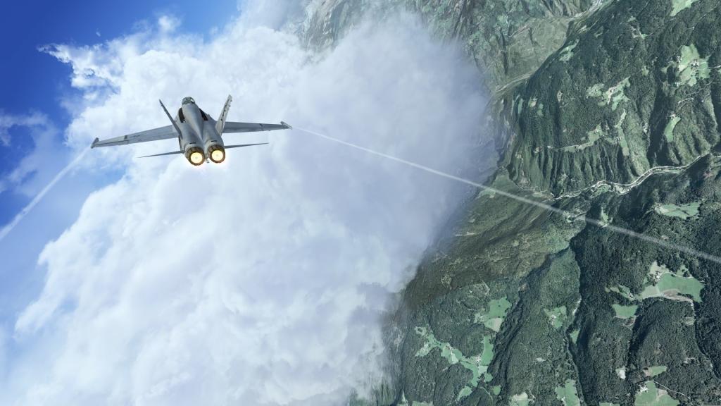 战斗机飞过山上的云